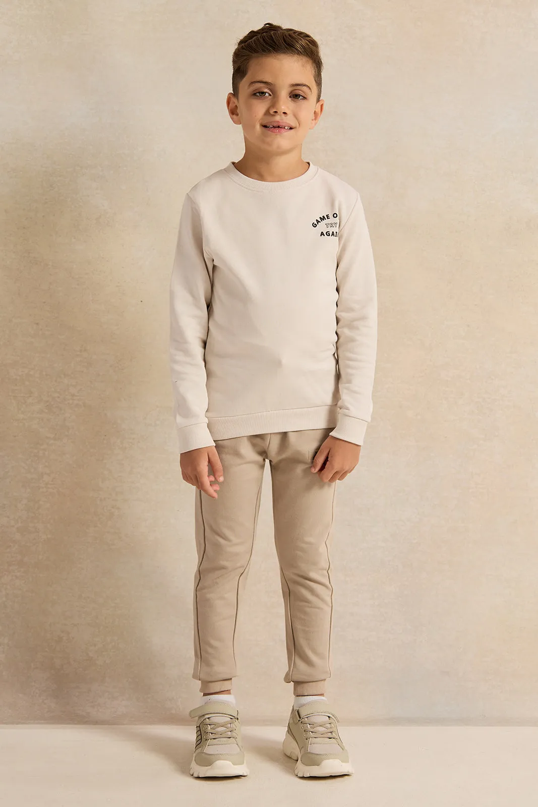 Boys Beige Printed Track Pants