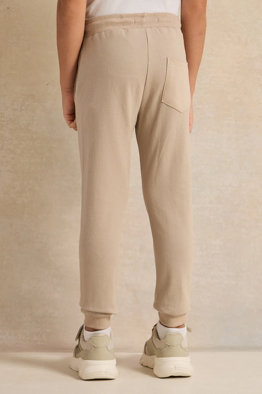 Boys Beige Printed Track Pants