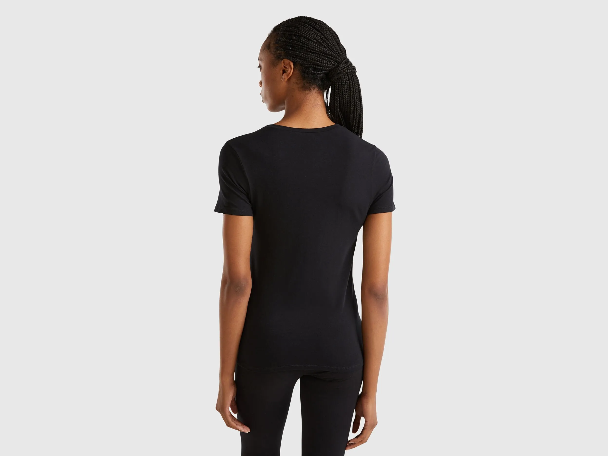 Short sleeve t-shirt in super stretch organic cotton - Black | Benetton